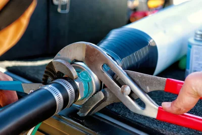 Pipe repair service using professional plumbing tools in Leesburg, Florida